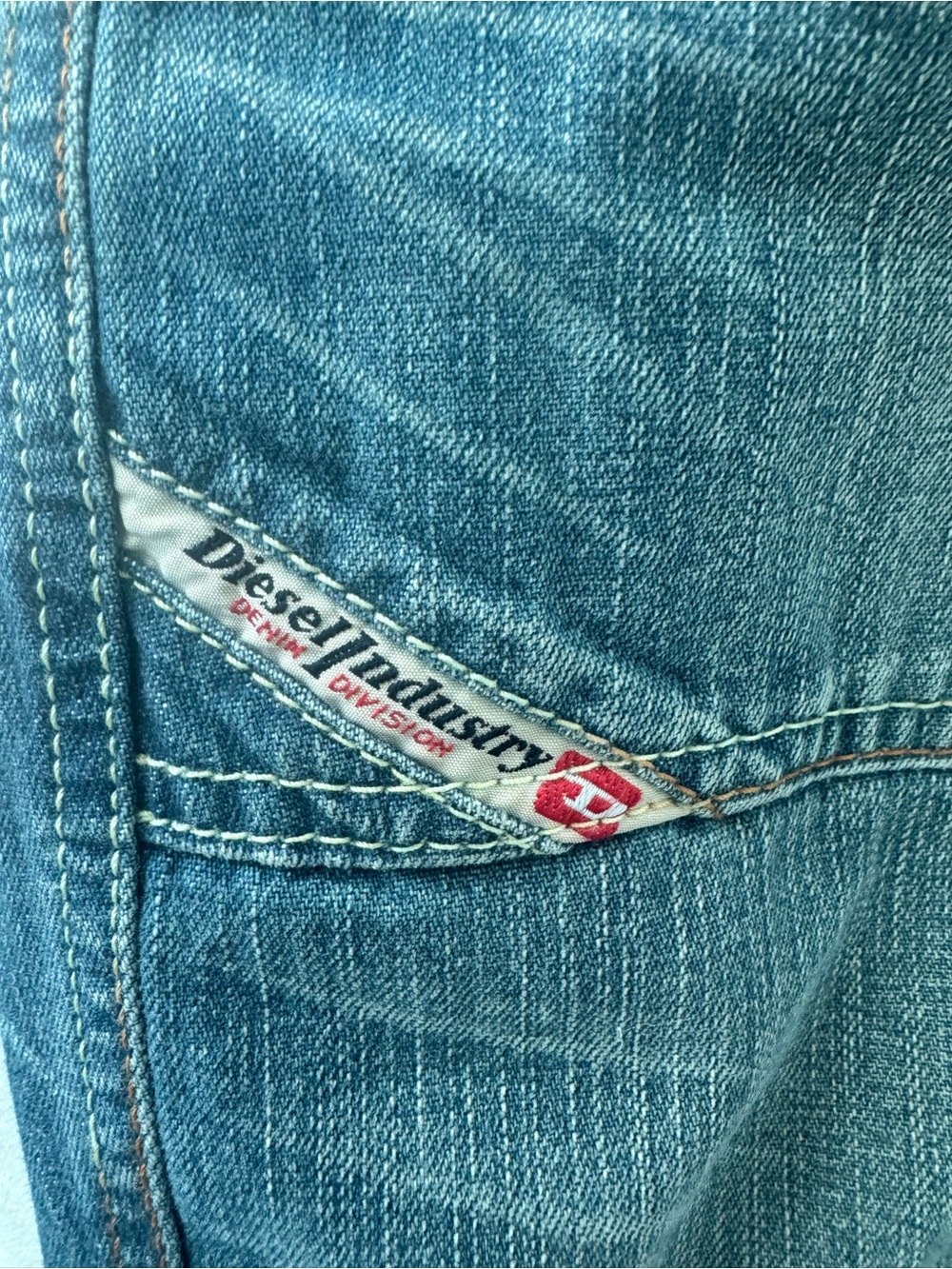Diesel Relaxed Fit Light Blue Jeans with Red Logo Detail